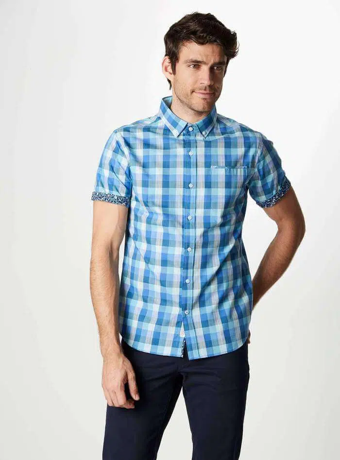 Short sleeve men's shirt in blue plaid pattern with floral sleeve cuff